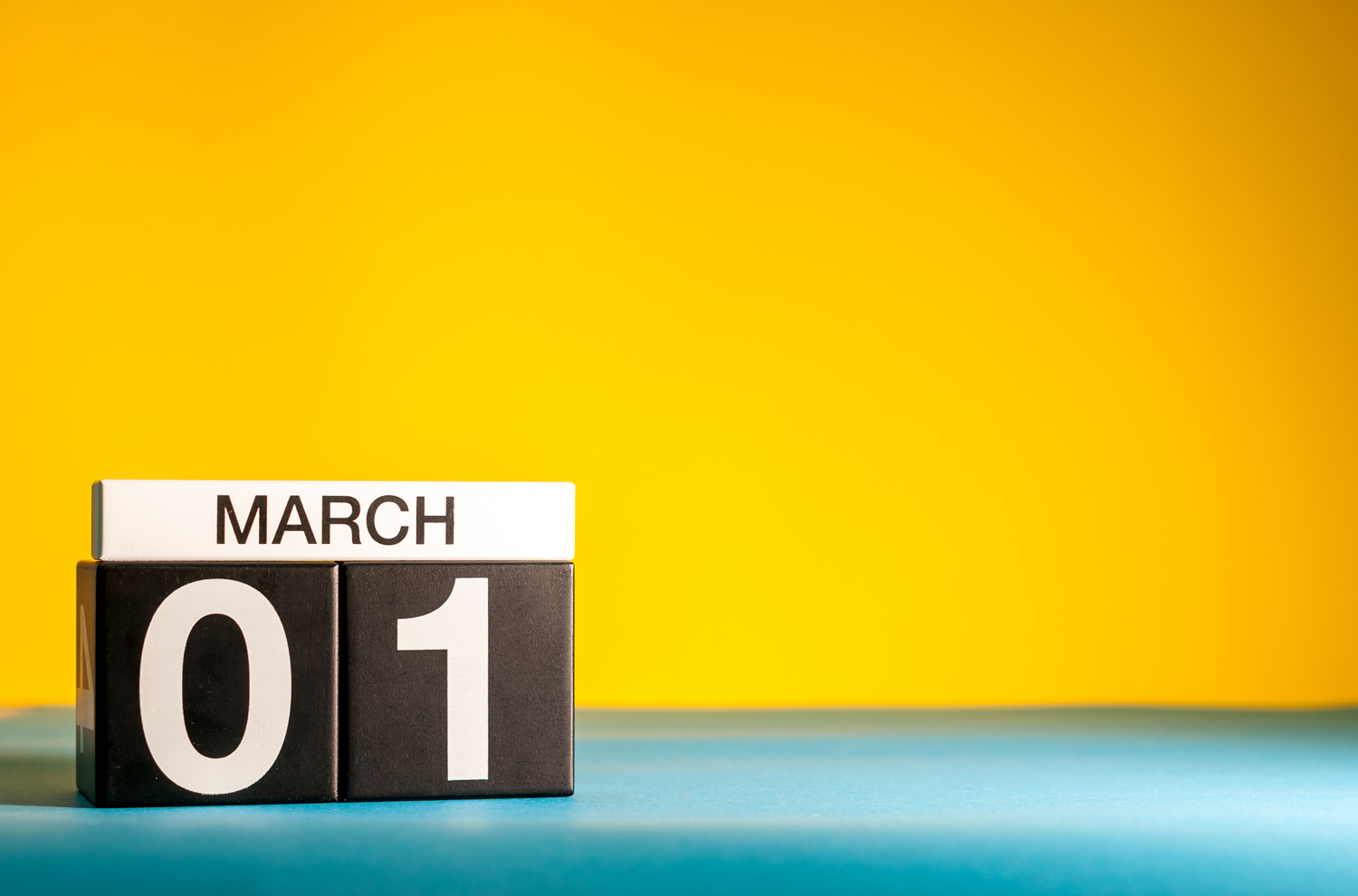 Letter blocks spelling out March 1