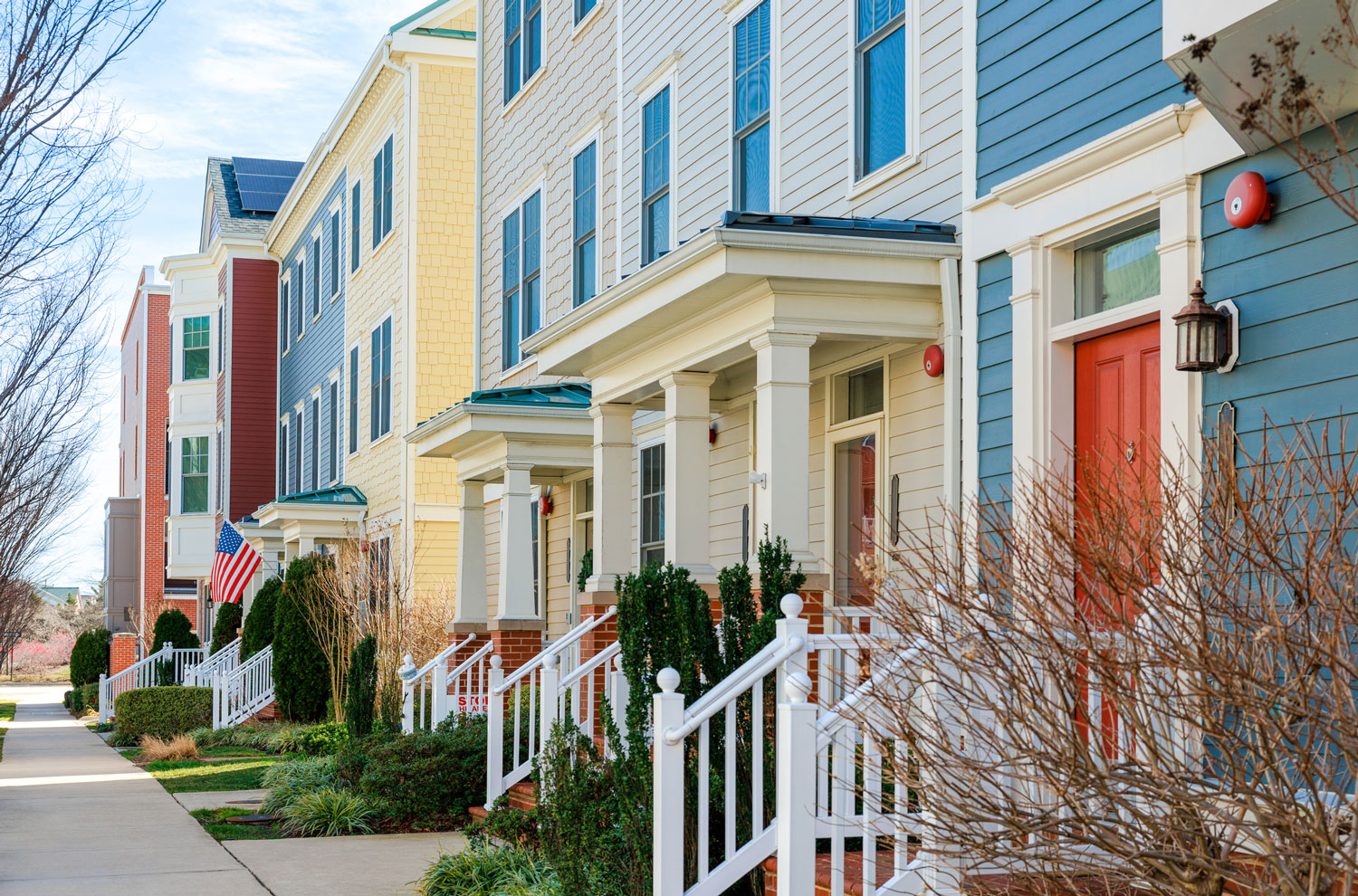 Row of colorful townhomes along Midwestern American street