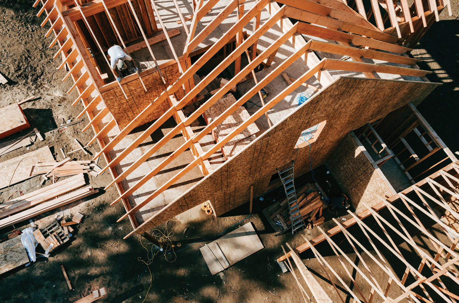 Aerial view of framing stage on new home construction